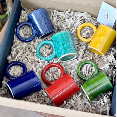 Handcrafted gift box of small mugs