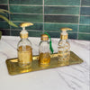 Hammered glass and gold brass soap dispenser