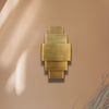 Tagant wall light in gilded brass