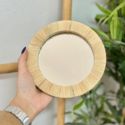 Small round mirror