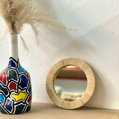 Small round mirror
