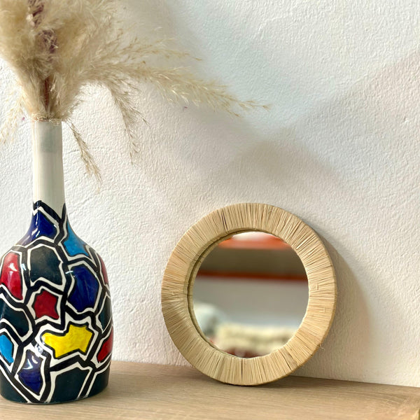 Small round mirror