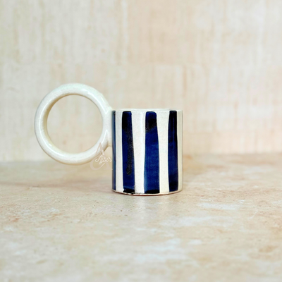 Blue striped mug with handle on top
